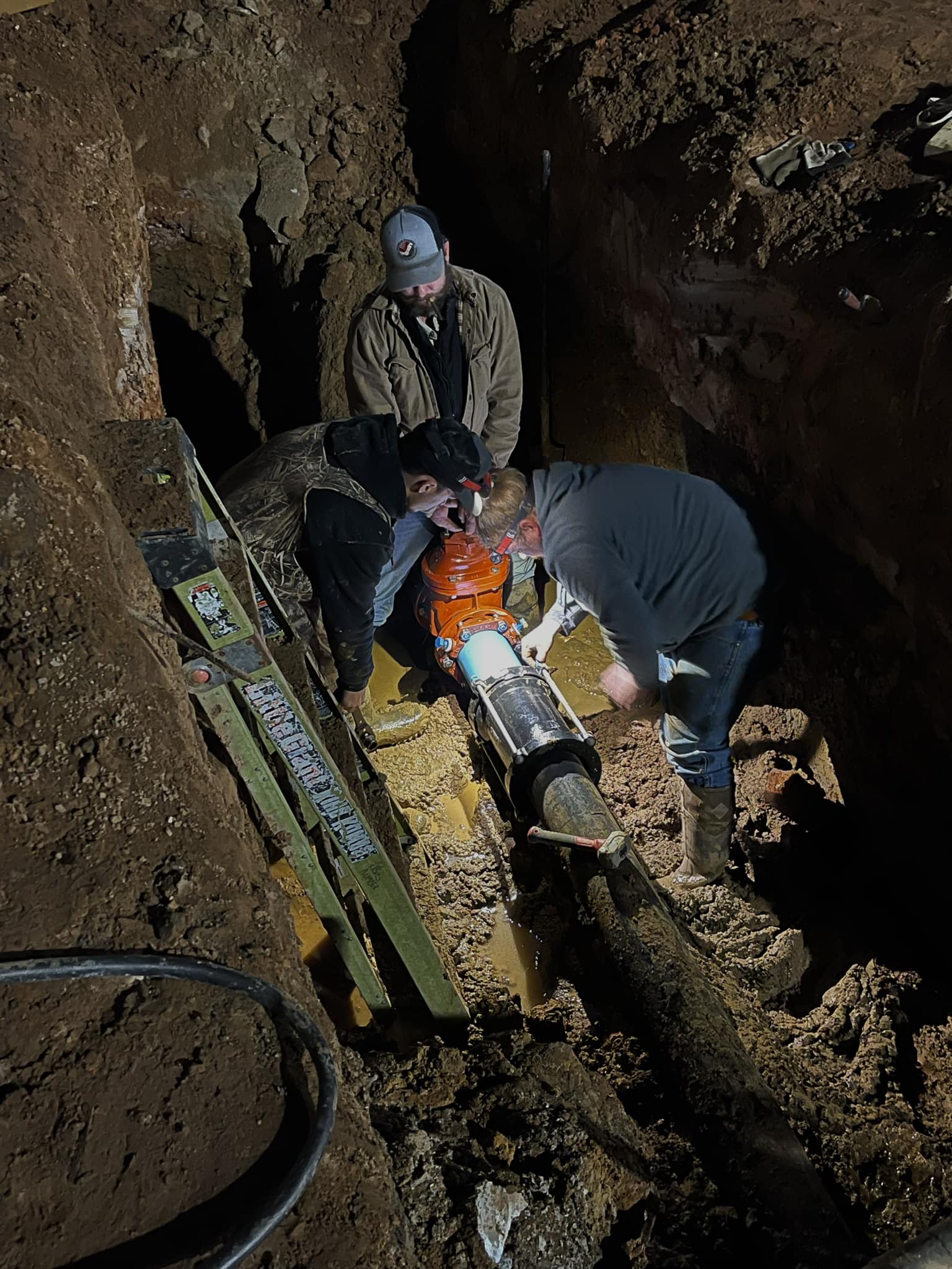 Crawford Plumbing, HVAC & Sheet Metal performs an emergency plumbing repair.